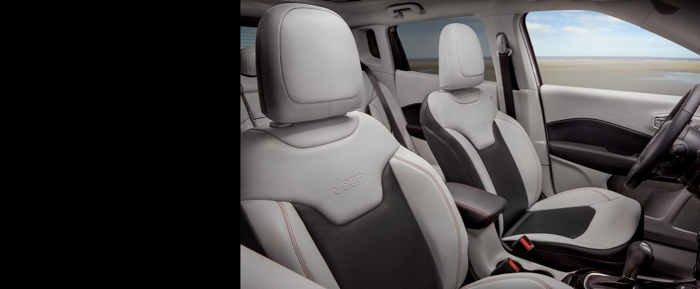 A close-up of the front seats in the 2021 Jeep Compass.