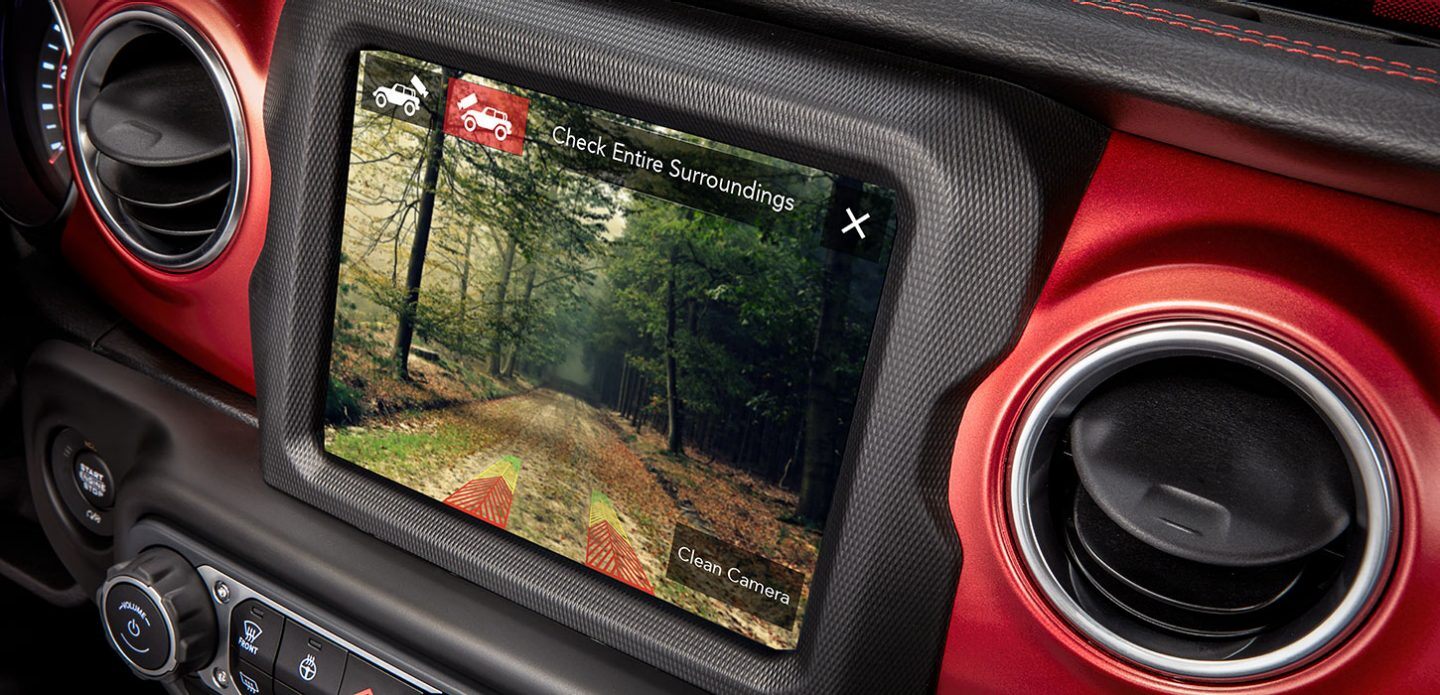 The Uconnect touchscreen in the 2021 Jeep Wrangler Rubicon displaying the view from the TrailCam forward-facing camera.